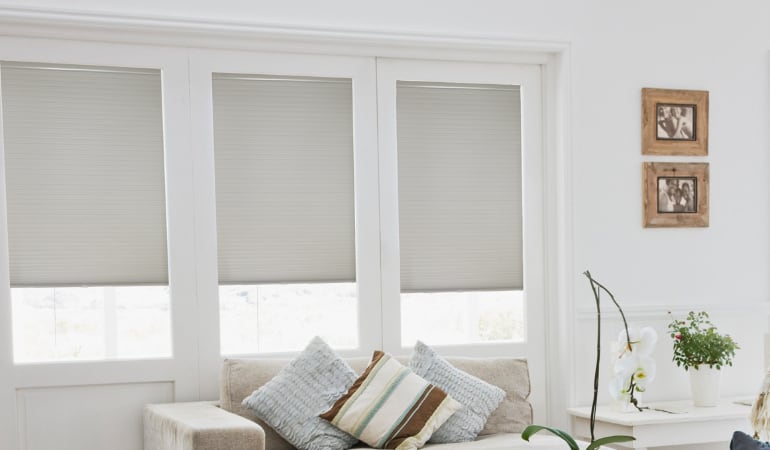Cellular shades in a living room.